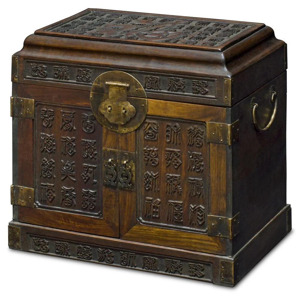 A traditional Chinese wooden chest with a round brass latch plate